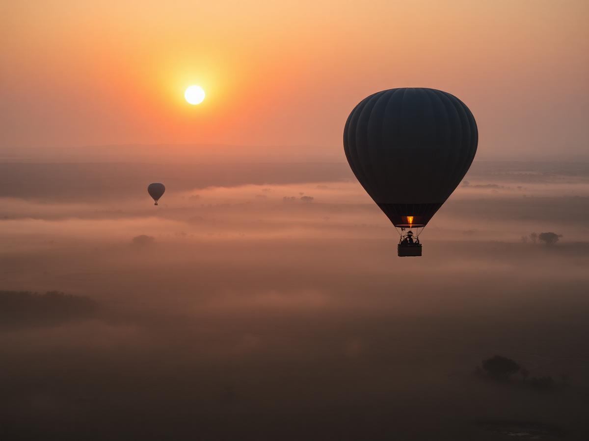 A Balloon at First Light Over the Mara